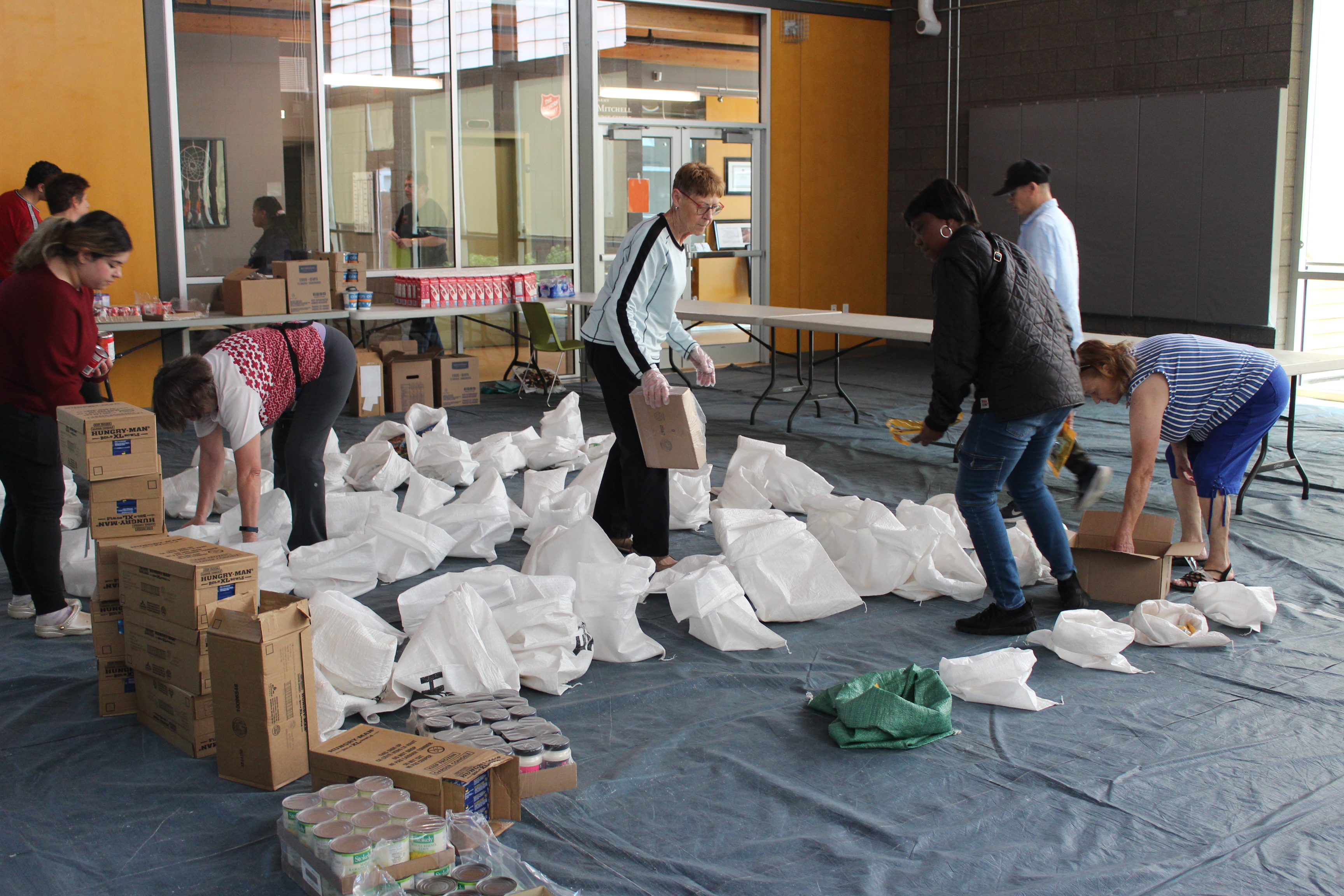 image showing people people sorting food items