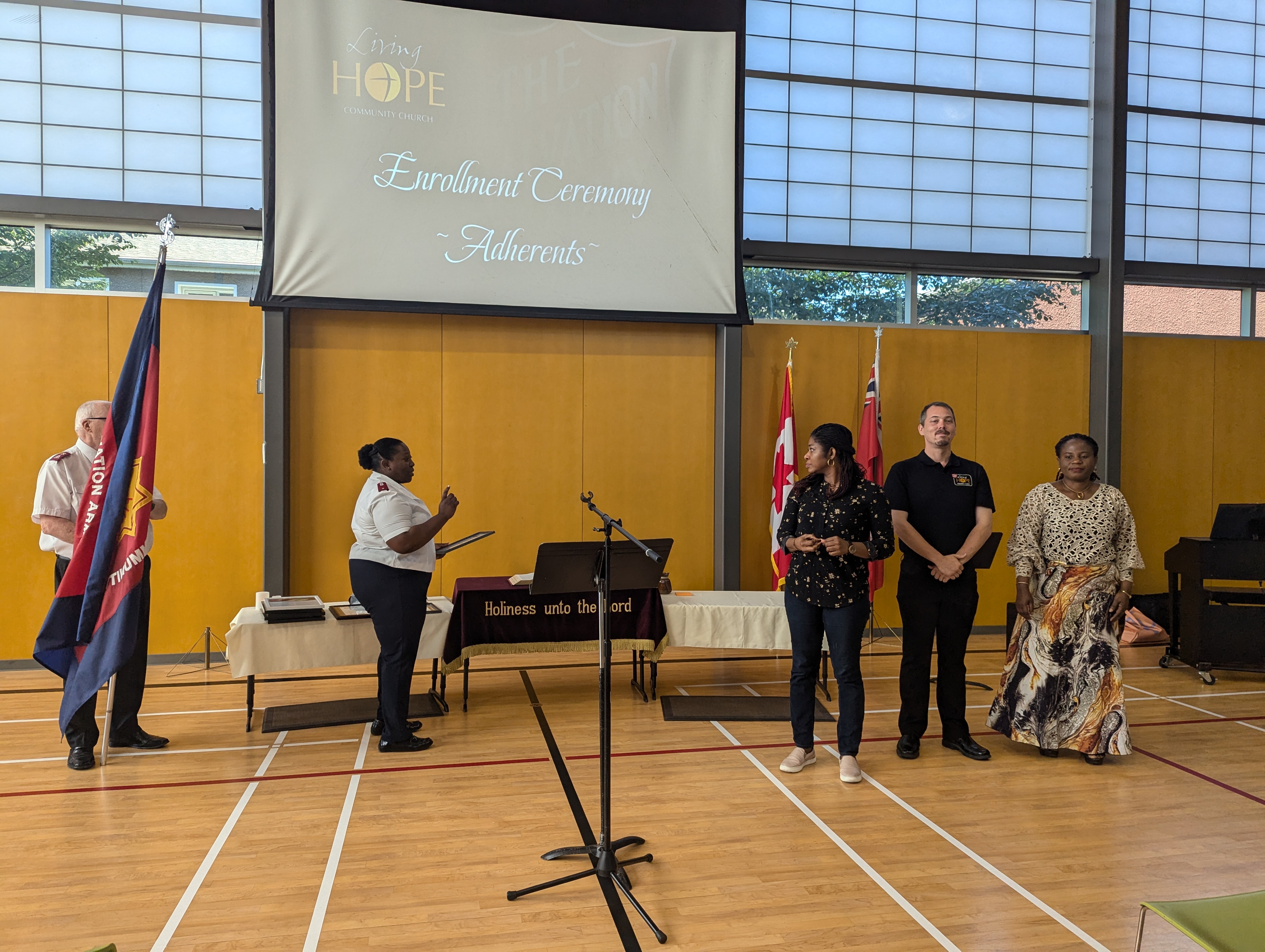 3 participants at the enrollment ceremony for Adherents at LHCC