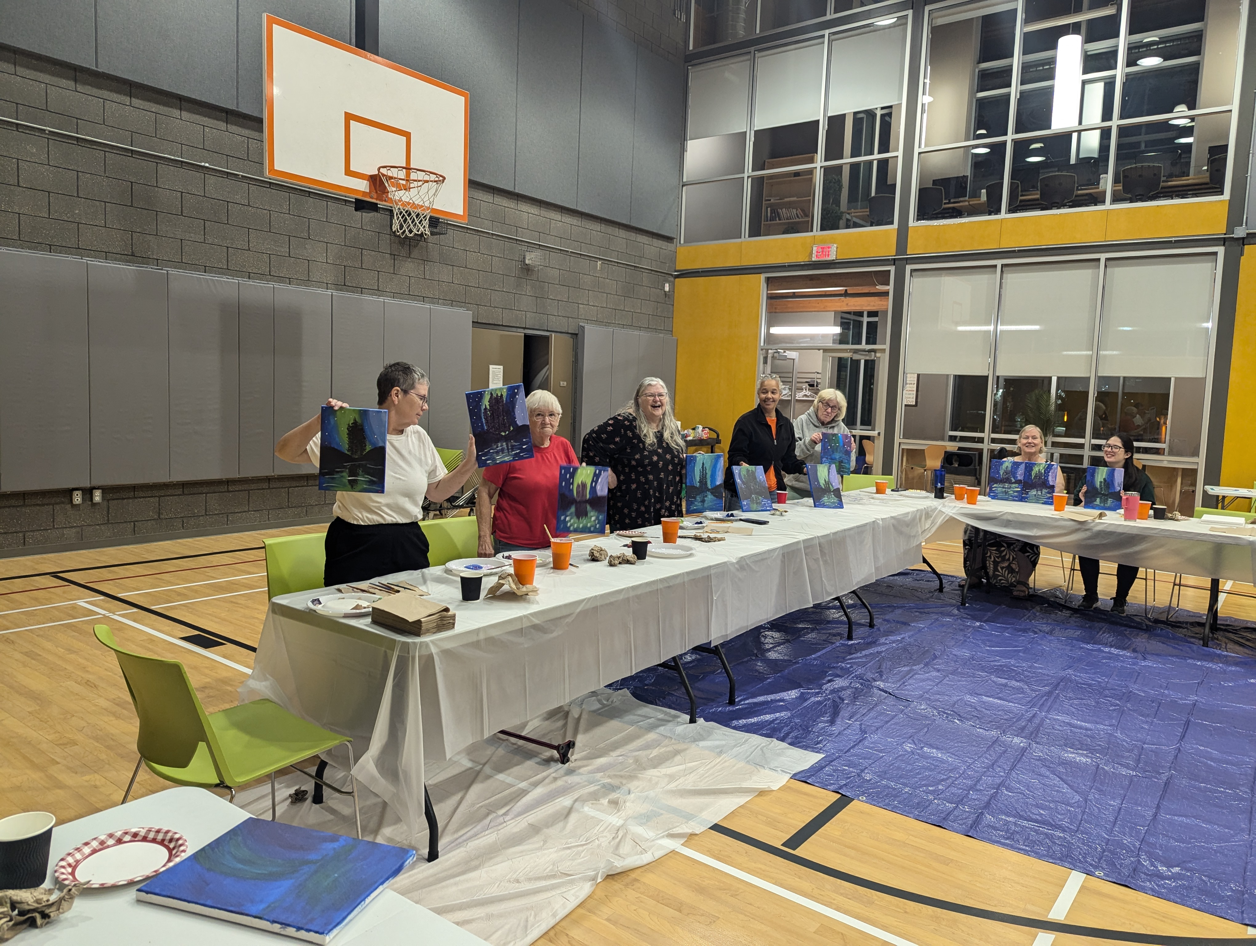 Group of Ladies participating in a Sip and Paint activity during the LHCC Ladies Night Program